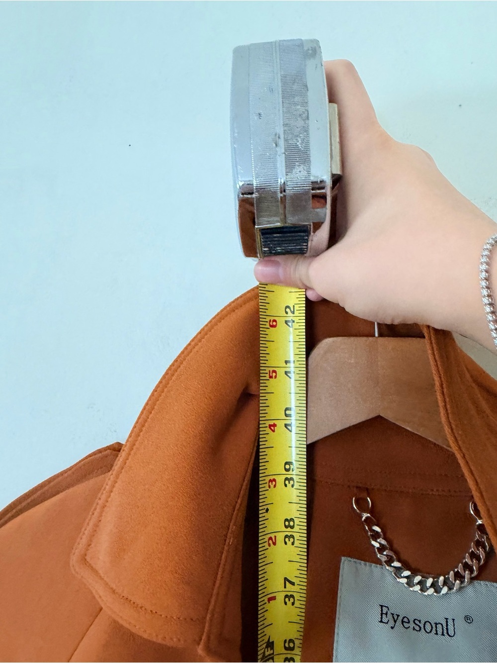 brown belted trench coat features distinctive shoulder epaulets and buckle strap - Picture 7 of 8